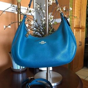 coach pebbled leather crescent crossbody bag blue